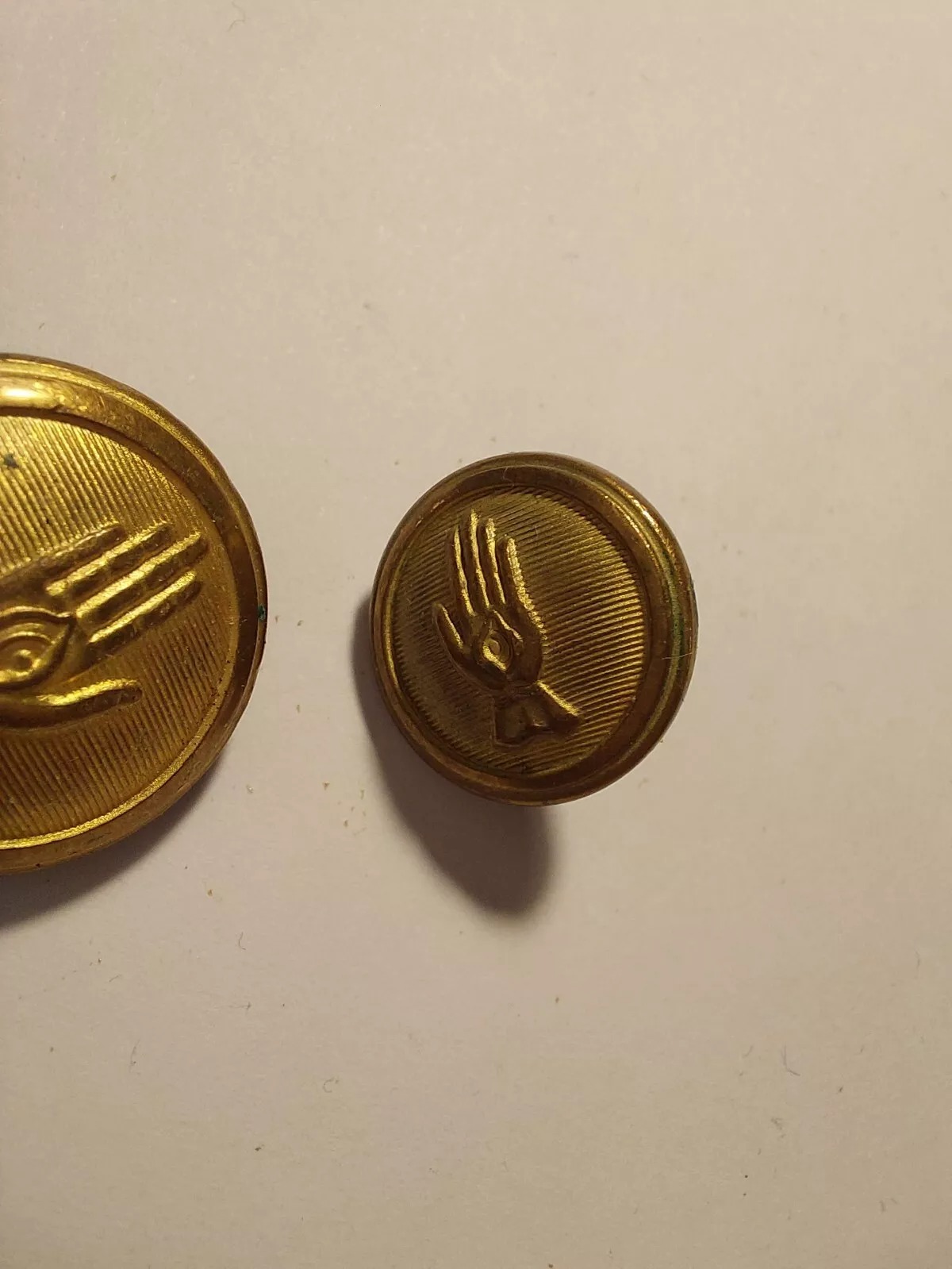 Pair of Vintage Icelandic Police Uniform Buttons – Gold-Plated Brass with Hand Motif - Image 3