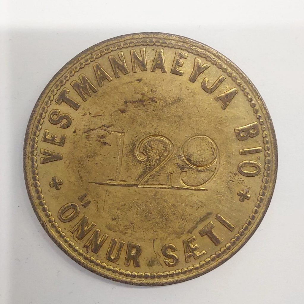 Seat token from the Burned Vestmannaeyjar Bio - Cinema 1973 Eruption - Iceland